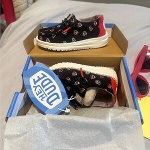 Brand new Toddler Girl Size 6 Hey Dudes. Never worn, still in the box.
